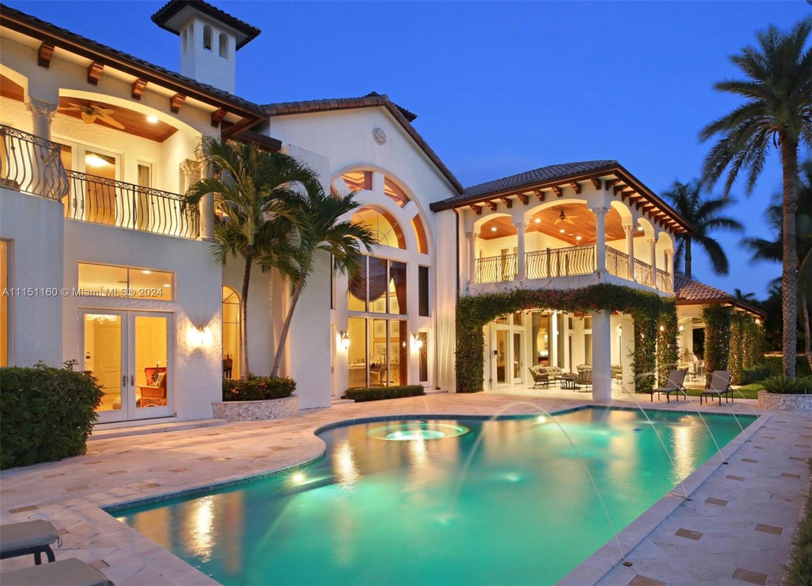 Splendid Gated Spanish Colonial inspired estate with 140 +/- feet of waterfrontage on the intracoastal of prestigious Boca Raton's Estate Section. A walk from The Boca Raton Resort and Beach Club. Shown by appointment only