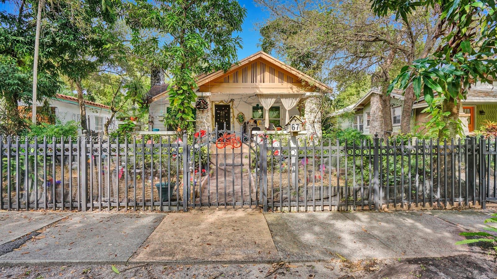 Do you love artistry, workmanship, & a connection to the past? Can you blend the old with the new & make something awe-inspiring? Come be a part of the historic fabric of this progressive & revitalized area & create your dream home today! Nestled in the Buena Vista East District of NE Miami, this 1924 historically-designated Craftsman Bungalow with great financial upsides makes excellent use of space, interesting details, character, & charm in an almost century-old home. Offerings include: impact windows, a broad and deep front porch with prominent coral rock piers, original fireplace, formal dining room, fruit trees, lush foliage, a peaceful and private backyard, and room for a pool. Close to the Miami Design District, Midtown, Wynnwood, Biscayne Bay, Downtown, Airport, & the Beaches.