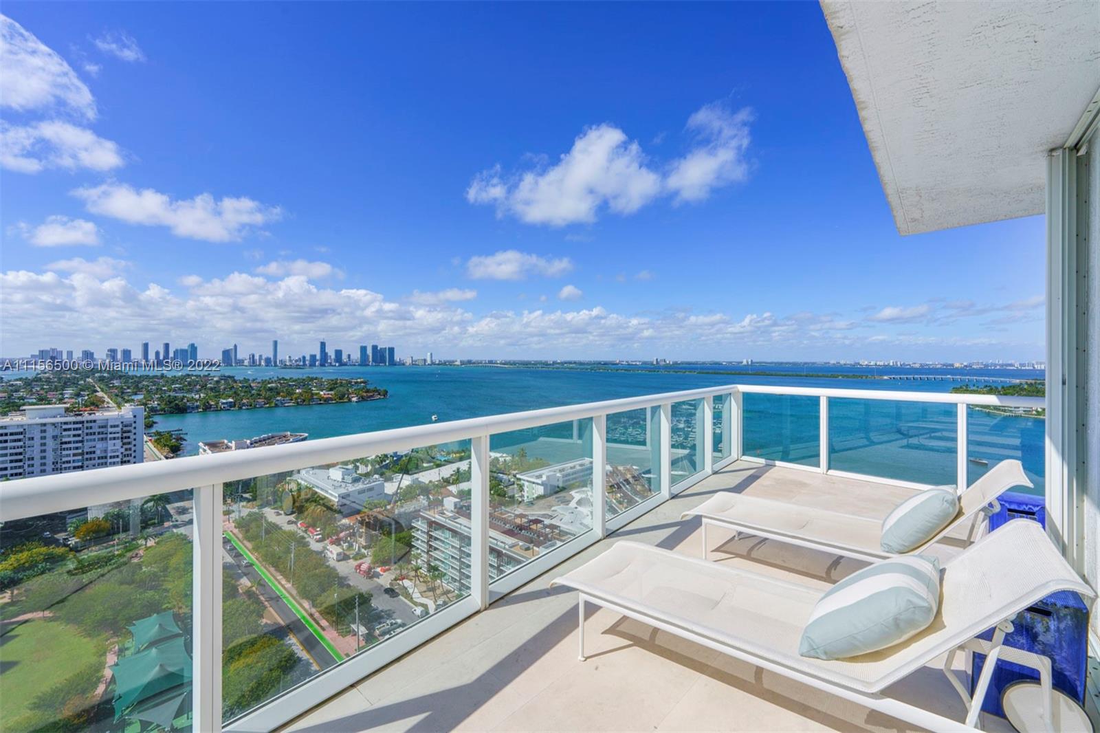 Miami stretches out before you from this one-of-a-kind PH Duplex on coveted Belle Isle. Sweeping views of Biscayne Bay, Miami skyline & the ocean surround this 3 BD,2.5 BA 4,750 SF home. Enjoy the 360-degree views from the warm, inviting interior or on 1 of the 2 oversized, wraparound balconies. Principal bdrm on main floor boasts 22’ ceilings, spa bath w/Sedona marble countertops & ebonized-maple cabinetry. Sliding glass separates the tub & sauna, where cream & beige river rock flooring & Majorca limestone incorporate elements of nature for a relaxing spa experience. Open gourmet kitchen features dark wood cabinetry by Snaidero, Miele & SubZero appliances & Calcutta gold marble center island & countertops. Upstairs a large office, media room & 2 guest bd’s complete this Miami Beach dream