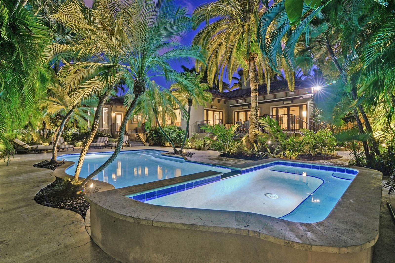 A luxury estate at its finest, in the private gated-Sagamore Cove Estates. A one-of-a-kind property sitting on 2.5 lots & 125-ft of waterfront on a canal off the New River waterway. Nestled in an exclusive private enclave of only 7 residences, this prime location is a short-walk to Las Olas. This lavish home w 5 ensuite bdrms 5.5 baths w top of the line LaFinestra windows, fireplace, oak floors&boasts 11ft ceilings. The 3 car garage could be transformed into livable space with A/C, as it is in pristine condition w storage & can be used as a separate entrance. An epicurean's dream kitchen featuring a restaurant grade 6-burner Garland gas range&2 separate sinks. Winding garden walkways, heated saltwater pool. Extremely detailed craftsmanship w the 3/4 of the home being newer construction.