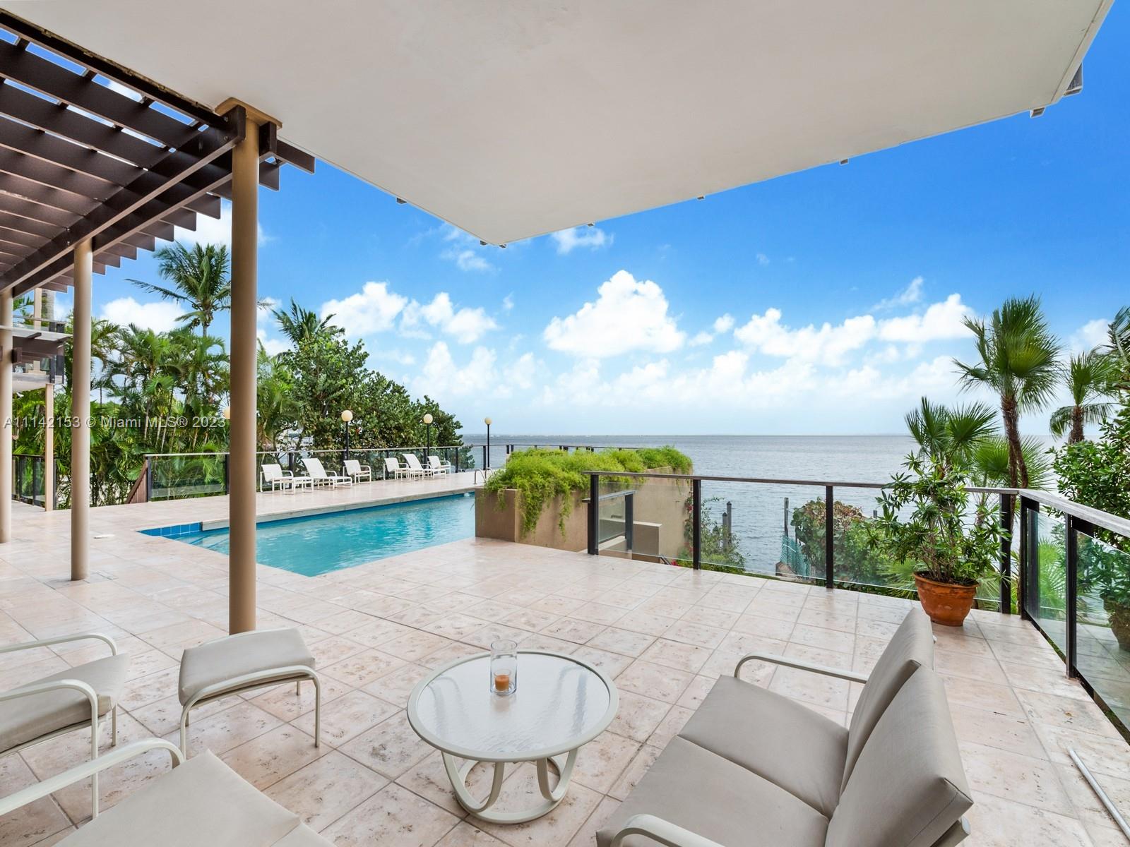 OUTDOOR COVERED LOUNGE AREA.