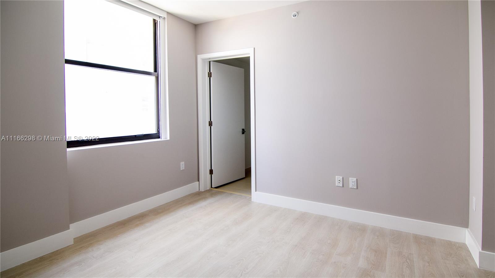 Bedroom Number 2 with a Closet and - private bathroom / bathtub. Facing North. Partial water view