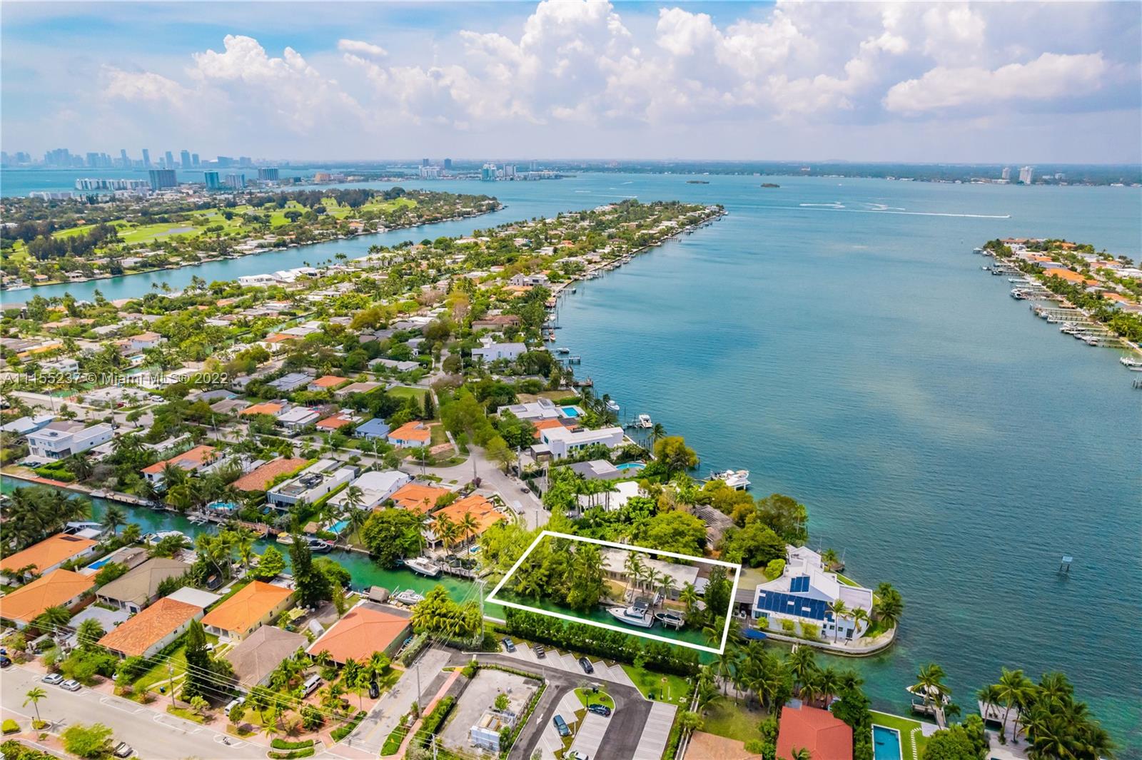 Unique opportunity to own a one of a kind home right on the magical Biscayne Bay in Miami Beach. This amazing renovated home, the inspiration of a designer and artist with the utmost care to detail. Great character in every corner inside and out. Sitting on 162 feet of water at the end of a channel, 30 feet from the open bay, it is ideal for a boater, complete with boat lift and a large dock. Biscayne Point is a gated island close to all the amenities of Miami Beach, yet secluded in it's own cul-de-sac shared with only two other homes. It has two bedrooms and a large artist studio, easily convertible to what your heart desires. This one will go quickly, so come see it for yourself. Biscayne Point is a gated Island.