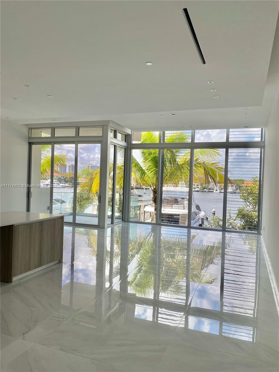 New Construction Waterfront Luxury Residences located at The Point in Aventura. Development is comprised of six unique town homes with Interiors by Steven G. Custom Finishing, kitchen and bathroom cabinets by Mia Cucina, Top of the Line Wolf and Subzero appliances.  12-14 Ft. Ceilings, Oversized waterfront balconies overlooking marina, Outdoor Patio and private staff quarters. Owners will enjoy The Point's 25,000 S.F. state-of-the-art Club and Spa, fitness center, Jacuzzi, Steam Room, tennis courts, 3 swimming pools, children’s playground, Spa cafe and more. You will fall in love the minute you step into this stunning home. No detail has been spared.