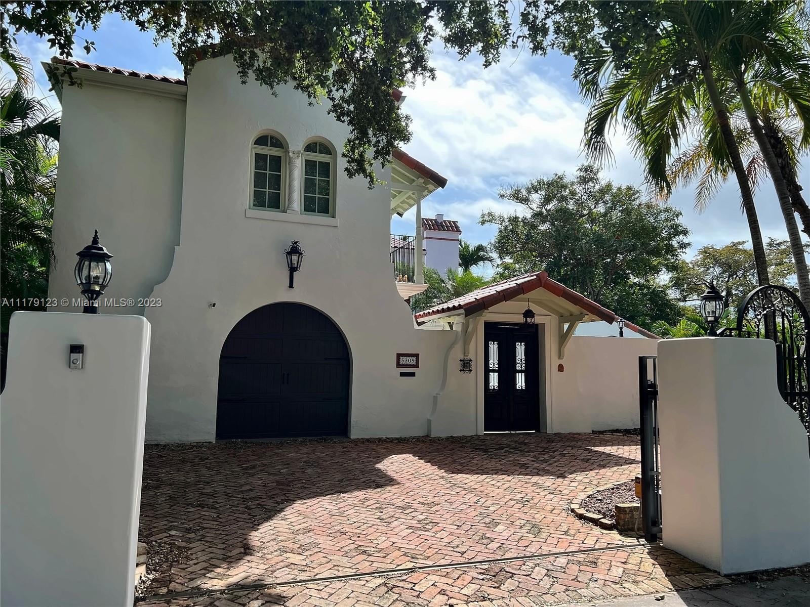 Stunning, classic Spanish style home built in 1926 by the famous architect Edgar Albright. The house has been renovated and is move-in ready. This is a 5 bdrm/ 4 bths home, on a 10,500 sq ft corner lot on the quintessential Alhambra cir in Coral Gables. Many entertaining areas incl. formal living w/ fireplace, formal dining, Florida room & charming interior courtyard with water fountain. Fantastic chef’s kitchen w/ center island, granite counters, wood cabinetry, gas stove and high-end stainless steel appliances. 3 bdrms upstairs incl. grand primary suite w/ terrace. 2 bdrm downstairs,  Relax around the heated and salted water pool. Lush landscaping. Gated, Chicago brick paver circular driveway. One car automatic garage. Impact windows/doors. Close to all commodities and great schools.
