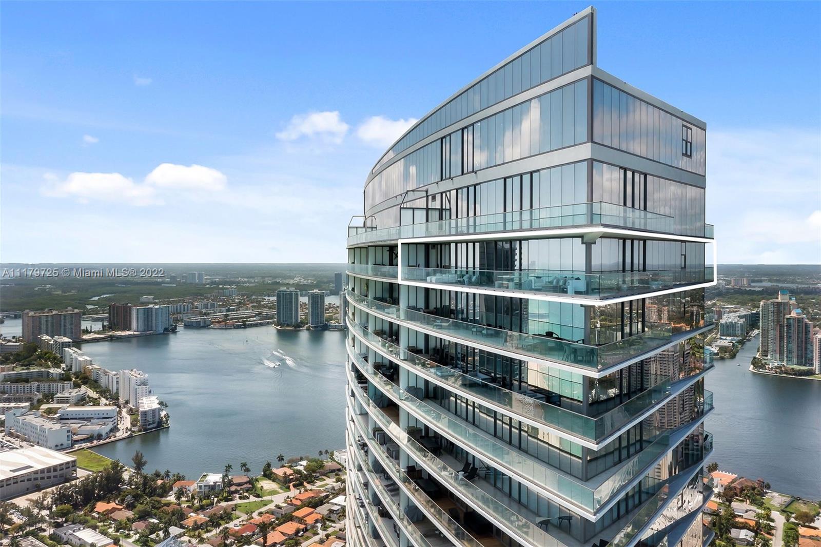 Extraordinary Sky Home. A unique corner unit on the lower PH level strategically positioned to offer the most incredible panoramic views of the Atlantic coast - northeast & southeast, Intracoastal and City Skyline. The sunrise will welcome your days and your nights will be lit up with amazing sunsets. The interior living space is elegant and modern (over $1million in upgrades). The terraces are expansive, 10'deep with summer kitchen creating a seamless expansion of your living space, perfect lounge area to meditate, read or simply relax.  This beautiful home is ready for you with every comfort imaginable including a private foyer, split floor plan, sleek European kitchen. Impeccable master suite with midnight bar and a fireplace with stunning ocean views. A dream come true!