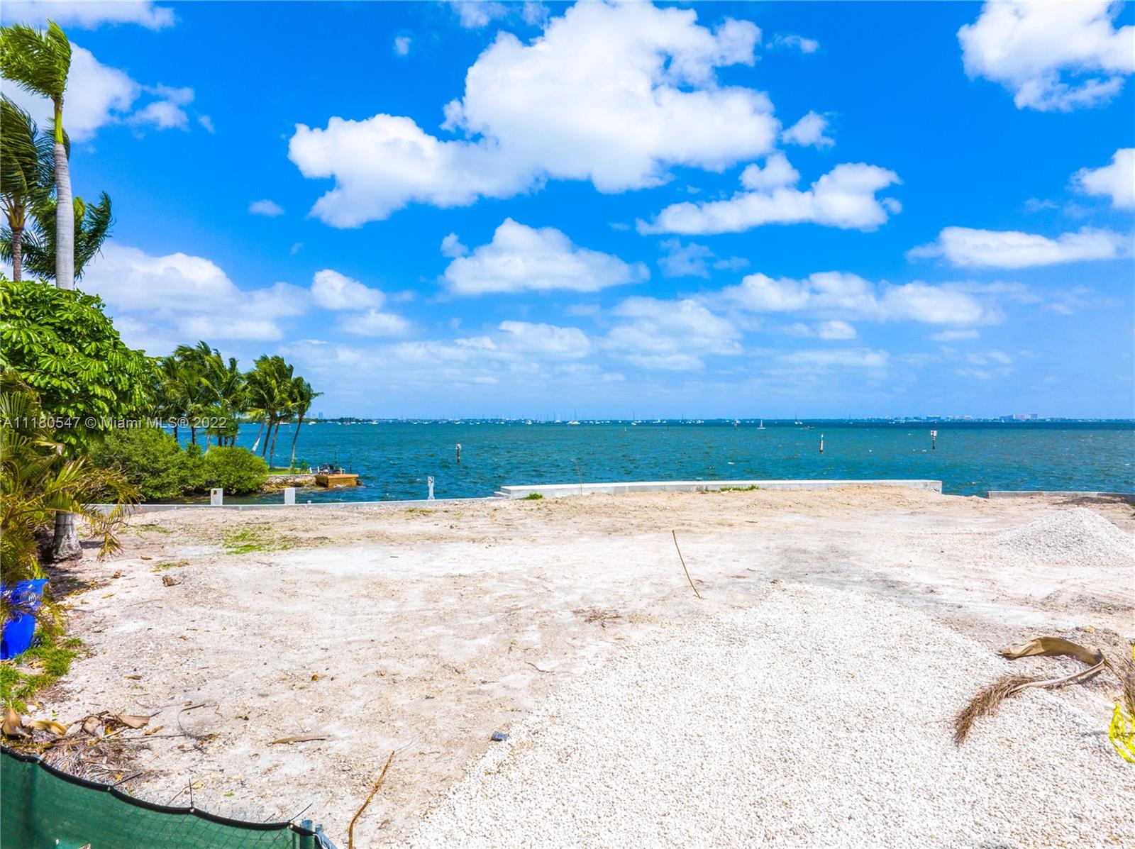 New construction, modern, waterfront home located in a gated community in the heart of Coconut Grove. Enjoy 6 bedrooms, 6/1 baths spread over 5,931 SF of Living Area. Full outdoor kitchen with seating, sweeping bay views and direct ocean access complete this masterpiece. Price is for completed home. Completion date set for last quarter of 2024.