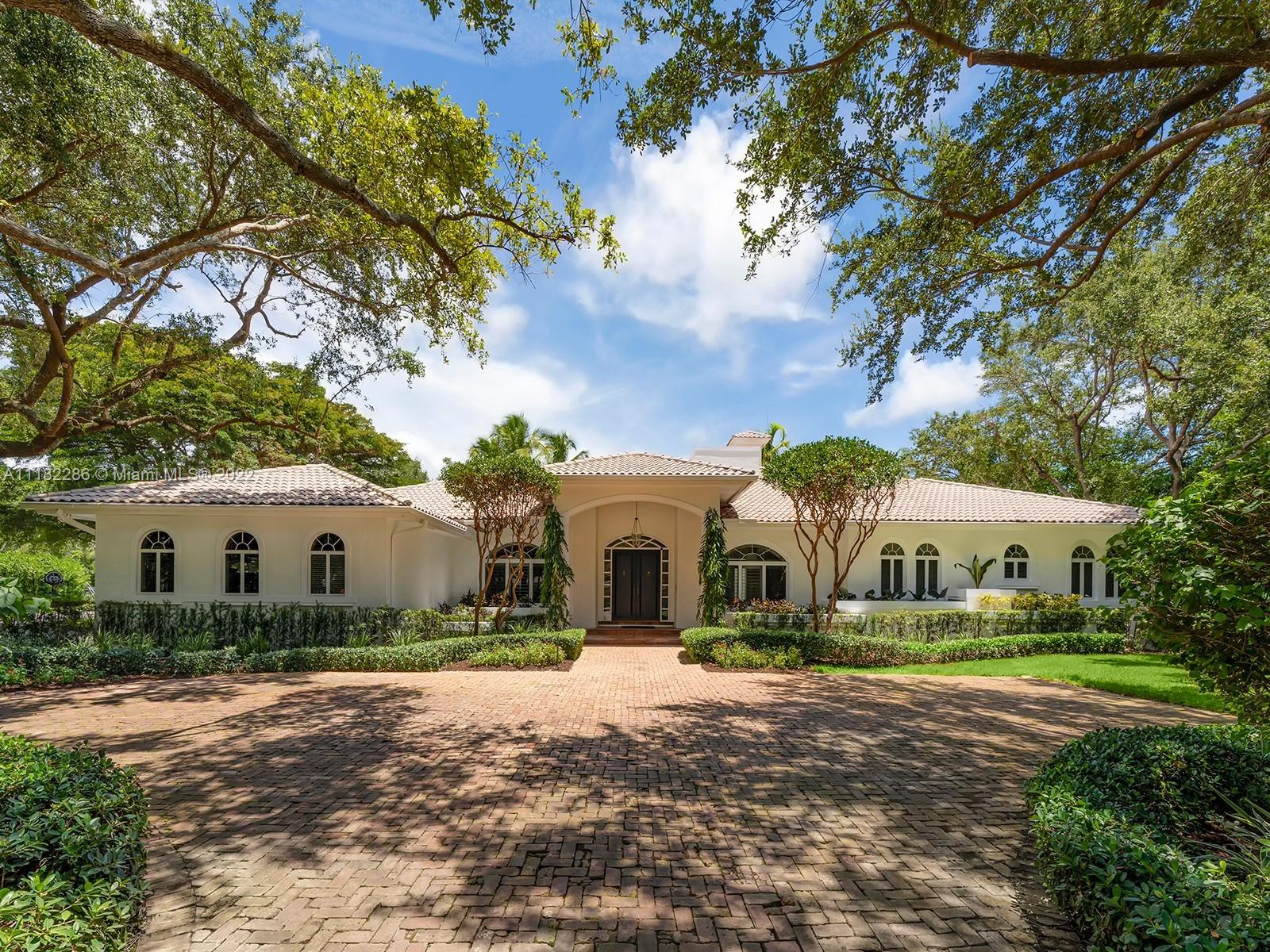 Prestigious one-story estate located in N Pinecrest on over an acre of pristine tropical landscaping. This gorgeous home offers a detached 2br/1ba guest house w/ full size kit, living rm, laundry & patio. Main house features 5br/5ba w/ large living areas perfect for entertaining family & friends. Greeted by a spectacular open flrplan featuring foyer, formal living & dining rm. Discover a gourmet kit w/ breakfast area overlooking the pool & two-way fireplace linked to the spacious family rm. Huge master ste offers 3 walk-in closets of which one can be a nursery/sitting rm, spa bath w/ his & hers vanities, jacuzzi, shower, & outdr shower. Enjoy the beautiful outdr oasis featuring a covered terr, lg swimming pool/spa & expansive yd. Add’l Features: media room, cabana
bath, 3 car gar, gated.