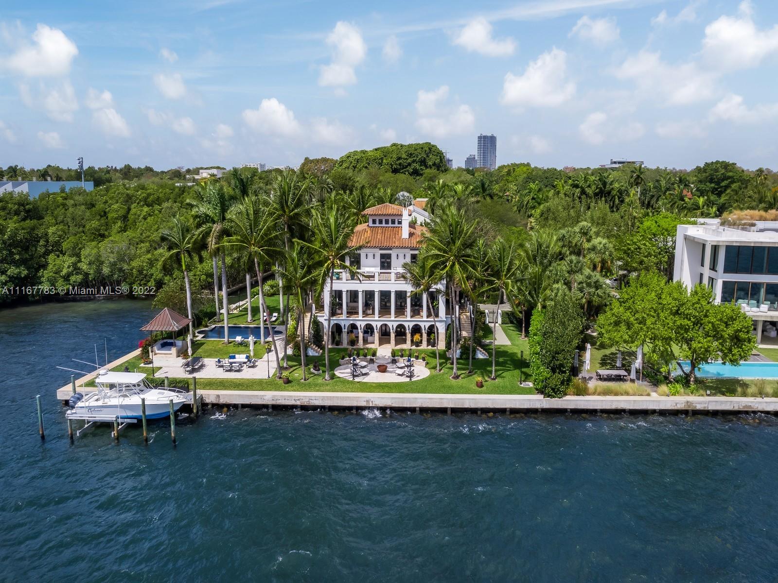 Located in a beautiful woodsy private enclave where only 26 homes enjoy its exclusivity, Camp Biscayne is one of Miami’s best kept secrets in the heart of Coconut Grove. Custom designed & built for its current owner, this 8 bedroom and 8.5 baths tri level gem was just renovated.  With over 300 ft of waterfront, a new Seawall, multiple entmt areas inside & out, this special house meets the most discerning demands of those who like to entertain & experience liv. one’s best life on the open Bay in Miami. The interior layout offers 180-degree views of Sailboat Bay, a true chef’s kitchen, Jerusalem stone flrs in liv. areas & Mahogany wood flrs adding a cozy & warming feeling to each room. Meticulous details & finishes as well as soaring 30 ft coffered ceiling & many more added features.