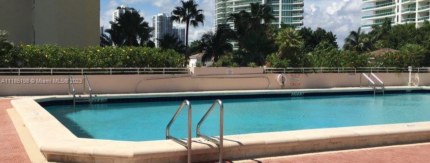 Resort style pool area with separate kiddie pool