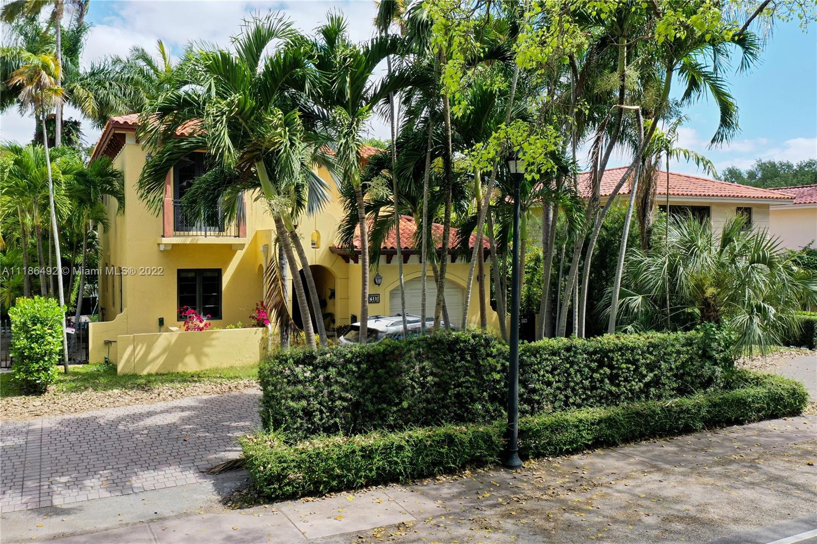 This Coral Gables gem has marble floors throughout. As soon as you walk inside, you are greeted by a large living and dining space. Downstairs you will find a kitchen with modern appliances that overlooks an additional family room, a bedroom ideal for a home office or guest bedroom, and a full size bathroom. Upstairs the bedrooms have access to an oversized terrace that overlooks the pool and garden with one room opening to a private balcony. Outside you'll find the perfect entertainment area with a covered outdoor kitchen with a built-in grill, pool, and garden. With a one car garage and a paved driveway, you can easily accommodate up to 4 cars. Complete with impact windows and doors throughout. Don't miss out! This one will go fast!