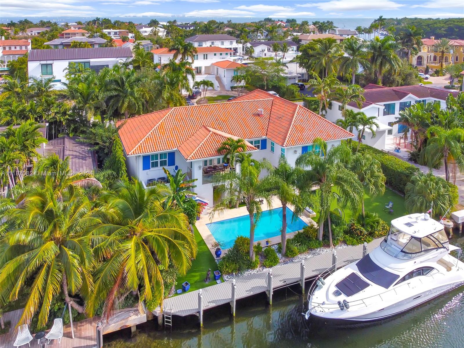 AMAZING waterfront home with 100Ft Dock in beautiful Coral Gables!!!! You don't want to miss out on this gem located in one of the most exclusive locations in the new tech and development capital of the world! Huge master suite featuring an integrated bathroom and closet feels like its own apartment. This home also features large living rooms, florida rooms, dining rooms, storage room, and recreational room with a downstairs bars that leads to its beautiful pool! Its huge driveway can ft 15+ cars plus two, two car garages! Bedrooms on both floor featuring porcelain floors and walls, fully remodeled, new A/Cs and everything you could ever imagine!