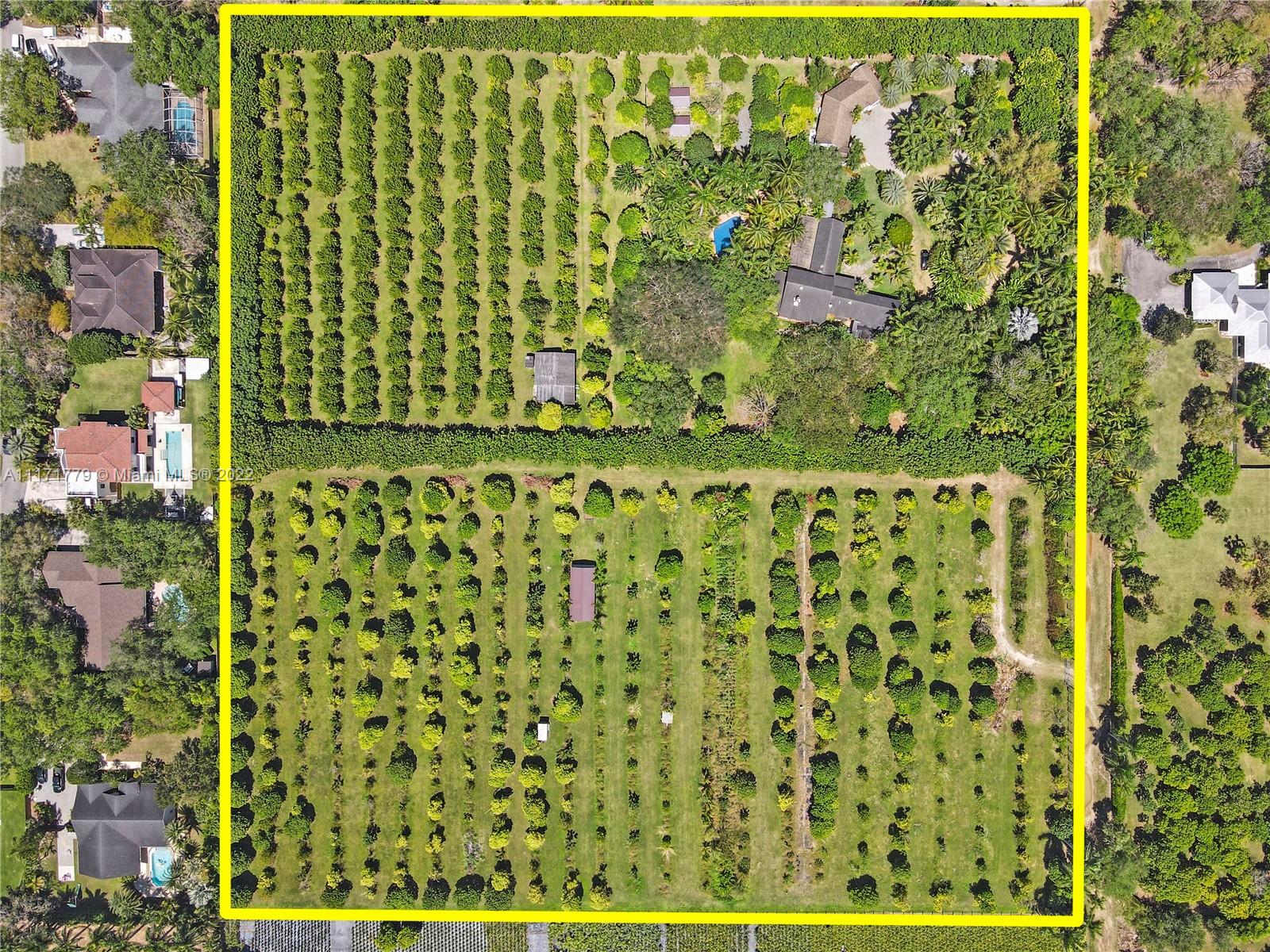 EXTREMLY PRIVATE W LUSH GROUNDS AND GROVES ON THIS FRENCH COUNTRY INSPIRED 10 ACRE COMPOUND. DESIGNED TO BRING THE INSIDE OUT AND ALLOW THE OUTSIDE IN.(SEE AND ENLARGE PHOTOS). LOCATED IN REDLAND W/AVAILIBILTY TO DEVELOP THE 3 FOLIOS. THE HOME SITS ON 5 ACRES  APPROVED TO DIVIDE INTO TWO 2.5 ACRE SITES & THE ADJACENT PARCELS ALLOW 4 BUILDABLE SITES OR LEAVE AS IS. ALL VERY ORGANIC W/GROVES LYCHEES (SWEETHEART+) CARAMBOLA,LONGAN  & ASST TROPICAL FRUIT.  A 4/ 2.5 BATH OPEN & SPLIT PLAN POOL WITH DBL SIDE OOLITE FIREPLACE DEFINES THE SPACE. A 4 CAR A/C GARAGE IS ATTACHED BY A COVERED BREEZEWAY. MULTIPLE LANAIS OVERLOOK THIS TROPICAL OASIS. HIGH AND DRY ON THE EDGE OF A HAMMOCK. IF YOU ARE LOOKING FOR PRIVACY, THE AVAILABILITY TO CONTROL THE SPACE AROUND YOU.THIS IS IT..