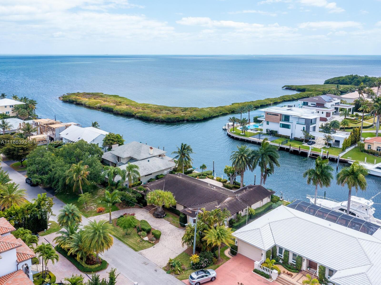 The 8th house from the point on the desirable San Pedro south wide waterway w/immediate & direct ocean access and outstanding views of Biscayne Bay! Private 100' seawall on protected canal makes yachting to the Florida Keys fun and easy. First time on the market 1970's Ken Parker original 3BD 2.5BA single story pool home w/rare 12'11" elevation provides renovation opportunity or build brand new for even more dramatic ocean views! Volume ceilings, impact windows, newer 3-zone AC's, laundry room, pantry and 2-car garage.  Gables by the Sea off Old Cutler Rd offers the finest schools in a safe, family friendly guard-gated community that's pedestrian, bicycle & golf cart friendly w/a neighborhood park & easy access to Pinecrest Gardens, Fairchild Gardens, Matheson Hammock & Deering Estate.A++