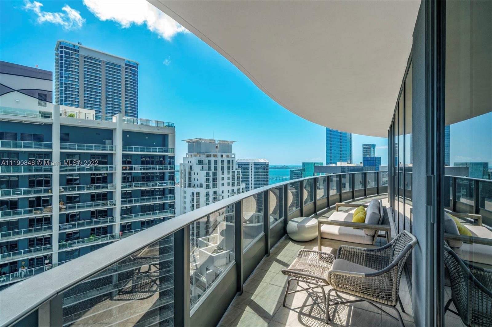 Located in the heart of Brickell, this contemporary and luxurious 2-bedroom, 2.5-bath condo is a must-see! Inside the open layout, walls of glass frame water views and fill every corner with sunlight. Custom wallpaper and upgraded light fixtures lend a sophisticated feel to the main gathering areas. Kitchen features include high-end Miele appliances, Snaidero cabinets, a peninsula with seating, and a large pantry with built-in storage. Electric blinds provide privacy when you retire to your bedrooms and custom closets offer plentiful storage. Marble is on display in the primary bedroom with a walk-in rainfall shower. Building has premium amenities with two pool decks, 64th floor gym and spa.