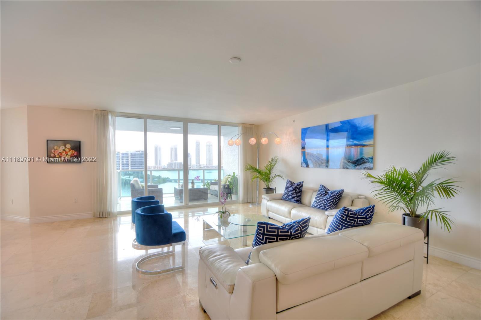 BEAUTIFUL UNIT !!Stunning direct views of Bay, Ocean & Sunny Isles' skyline to the East & amazing city views to the West from this 3 Bed + Media Room / 3.5 Baths. Flow-through apartment in the Luxury Peninsula One. A private elevator opens right into the unit, marble floors in the common area, Kitchen w/granite tops, Sub-Zero frig, Utility room with washer & dryer, state-of-the-art security, and concierge! This is a buyer's dream home!
