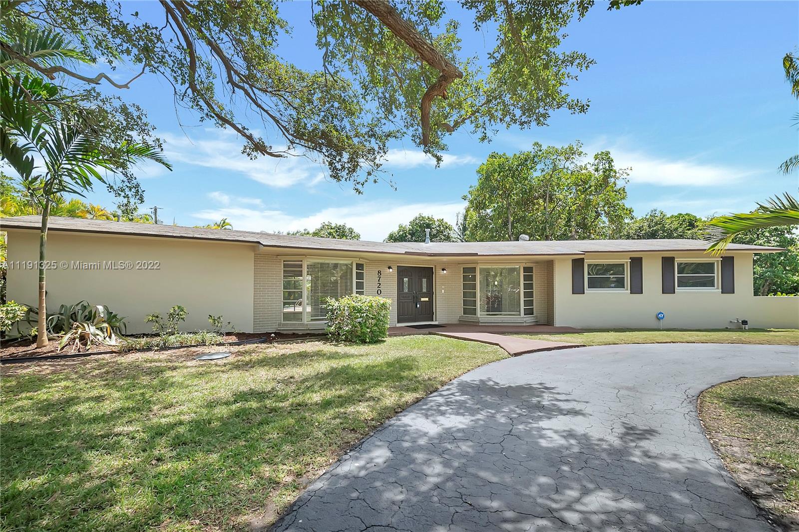 Charming Coral Reef Gardens 4 Bed / 2 Bath home with 2 car garage, circular driveway on a 15,250 square foot lot. Large Covered and screened patio with a pool. Space for a boat or RV. Schedule a showing today.
