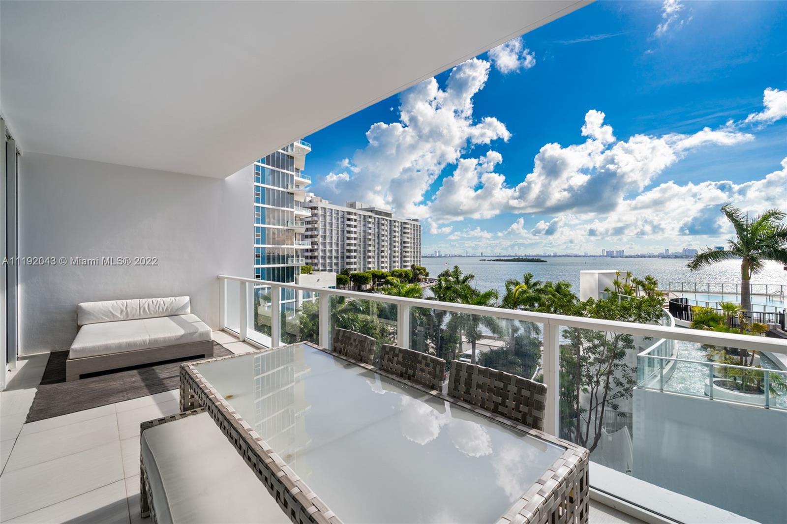 Welcome to Paramount Bay; The definition of Luxury Living in Edgewater Miami. This unit features 2 beds & 2 baths and a private elevator foyer. Enjoy this spacious floor plan perfectly designed for a seamless flow of indoor and outdoor living so you can enjoy the endless water views! The property is decorated with Restoration Hardware and custom Italian furnishings and features an oversized balcony with day bed and dining table for 6. The unit leads directly to the main pool area with cabanas, grill area, bar and fire pit. Other amenities include full service gym, spa, meeting rooms, kids room and 24 hour valet / concierge.