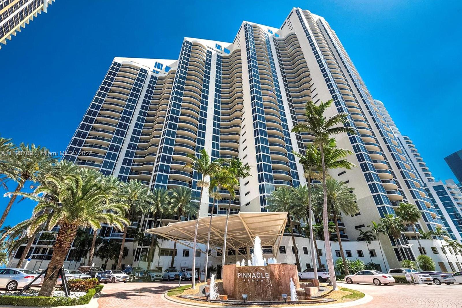 Enjoy Stunning direct ocean views from this spacious flow through residence located in the prestigious Pinnacle building, one of the most sought out buildings in Sunny Isles Beach.  This unit has a great floor plan, living room with incredible ocean views, large Laster Suite with lots of light. Spectacular views from every room. Open kitchen features granite counter top, wood cabinets, and equipped with top of the line appliances. Building features pool, beach service, tennis, fitness center, steam, sauna and 24 hrs. valet. Walking distance from restaurants and shops. MUST SEE!