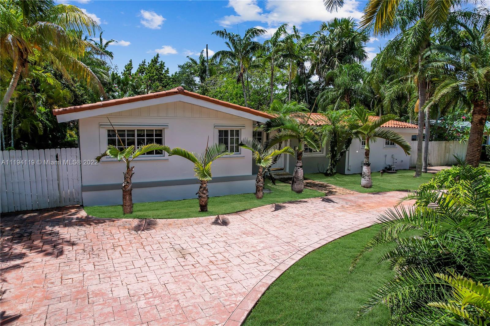 This spectacular 4 BR/3BTHS residence in Pinecrest sits on a 15,000 sq. ft lot and it is perfect the perfect home for entertaining: updated eat-in kitchen with stainless steel appliances, granite countertop and modern cabinets, spacious dining room with a beautiful view and access to the lush backyard, large living room, spacious family room and laundry room. This gorgeous home also has a great patio with a large backyard and an ample front entrance with a circular driveway with plenty of parking. Just blocks away from US-1 with easy access to major stores, fine dining and entertaining. A+ excellent school district. Come and show, all offers will be considered.