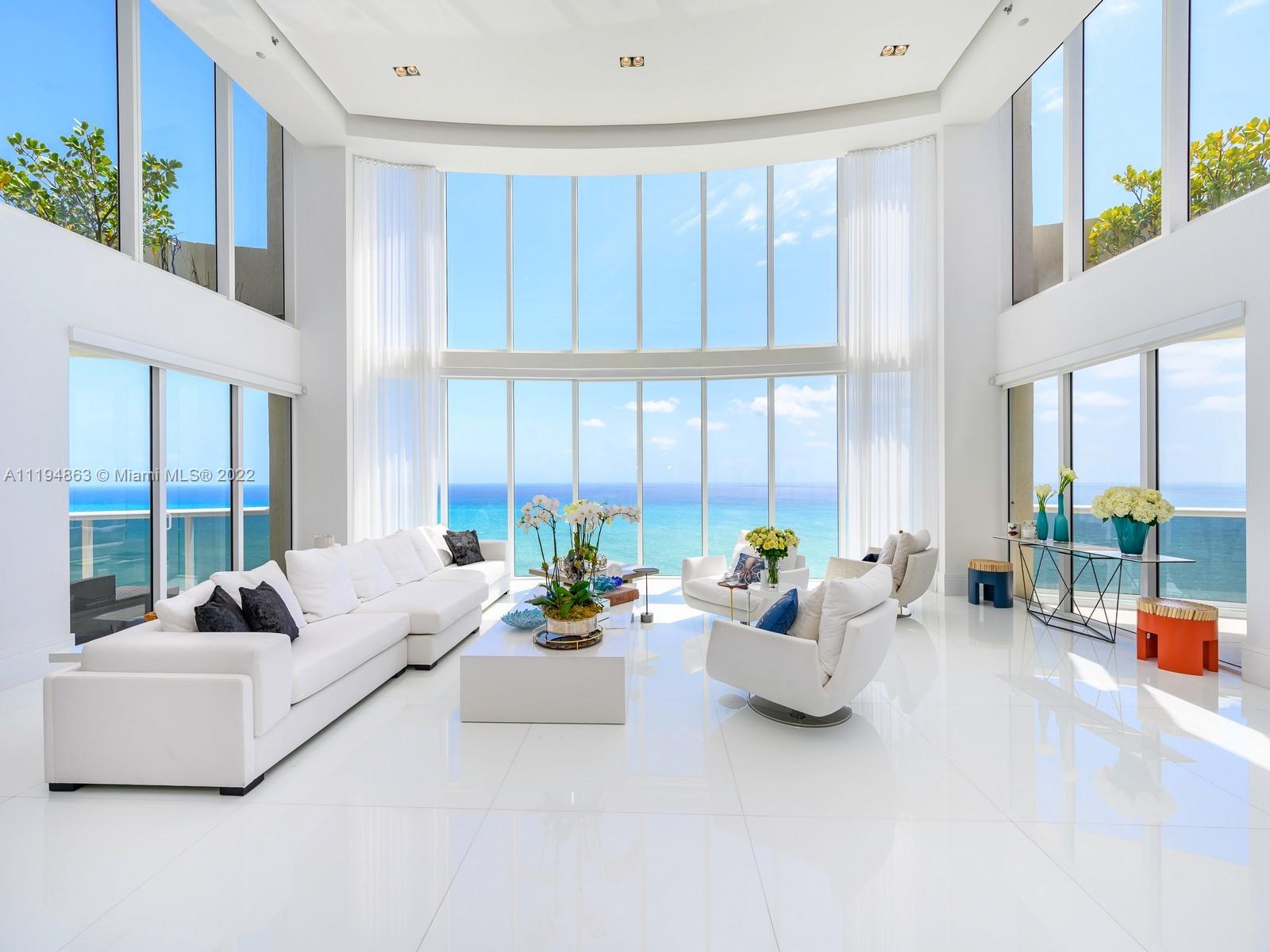 This FULLY FURNISHED unit is surrounded by 180 degree OCEAN VIEWS and private elevator entry, this residence is the ultimate beachfront retreat with the most expansive floorplan available. This 5,901 SF 2 story fully remodeled penthouse offers 6 beds, 6.5 baths and 4 balconies to the north and south. Bright interiors, porcelain floors throughout and floor to ceiling windows. Creston smart home system, modern updated kitchen overlooks the ocean with top-of-the-line Miele appliances including electric double oven and stove, subzero fridge, and granite countertops. Full-service luxury building amenities with resort-style rooftop, hot-tub, top-tier gym, restaurant, private beach service, tennis court, security, massage room, and more! Unit includes 4 parking spaces and storage space.