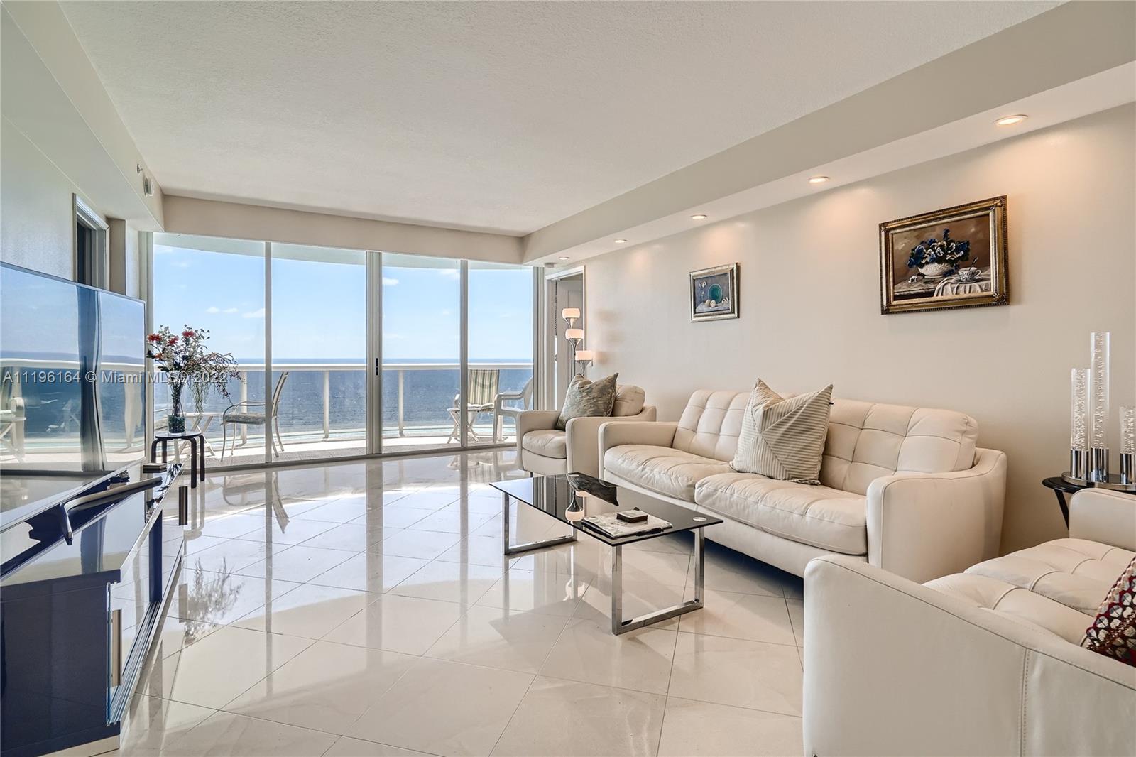 Spectacular and Gorgeous Flow-Through 3 Bedroom 3 Bathroom in The Pinnacle Condo. Breathtaking Ocean Views, Impact Windows, Huge Master Suite with Double Sinks, Roman Tub and Walk-In Closet. First Class Amenities such as a Heated Pool, Tennis Court, Exercise Room, Library, Theater Room, Sauna, Children's Playroom, 24/7 Security, Valet Parking, Beach Service and More!