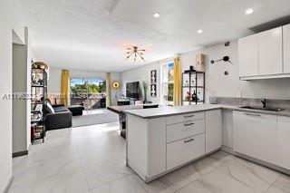 Beautiful remodeled large 2- bedroom apartment in the heart of Dadeland mall facing the garden and the pool.