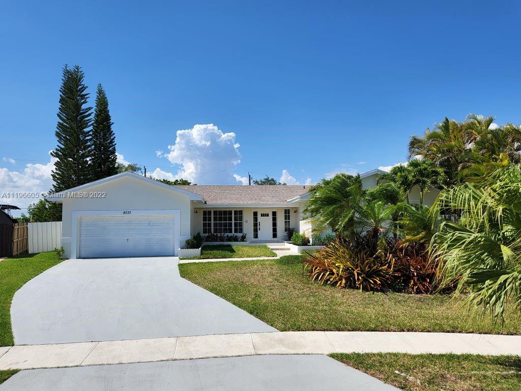 This beautiful family home greets you with high ceilings as you enter the foyer area. French doors and windows give
plenty of natural light and expansive backyard views. This home has 4 bedrooms, 2 bathrooms and an oversized 2 car garage that sits on an extra-large lot on a cul-de-sac with views of community lake with beach access in Cutler Bay. Formal living and dining room with extra high ceilings. Kitchen with island and seating. Lovely master suite with French doors that leads to patio. Extra-large backyard terrace for entertaining.