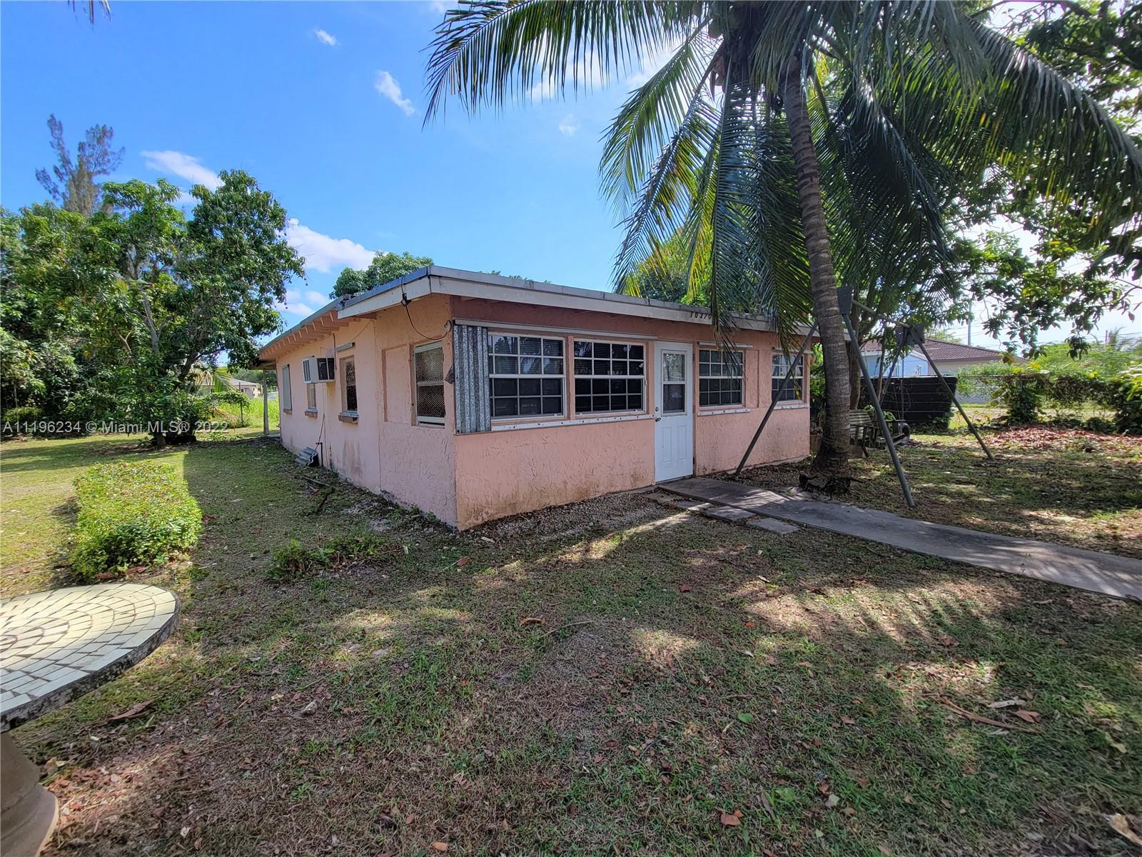 This concrete construction home has room for expansion! This 4/2 SFH is situated on an irregular, but expansive lot. Great for investors. Located in an opportunity zone. This property is a must see.