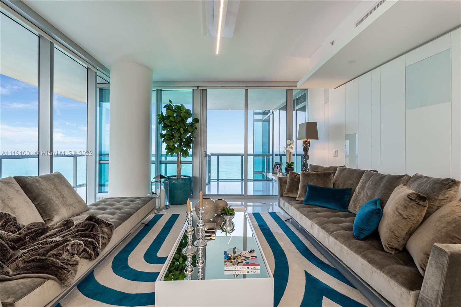 Spectacular fully furnished oceanfront residence at Jade Ocean. Professionally decorated 3 beds/3.5 baths corner unit with Artefacto, Adler and Italian furniture, white quartz flooring, Miele appliances, wraparound balcony and private elevator entrance.