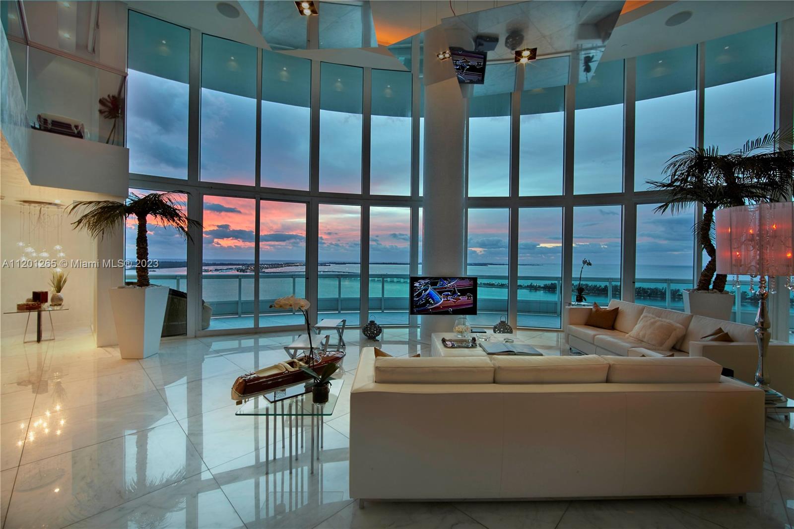 The iconic Santa Maria on Brickell. Residence 2902 offers mesmerizing views of the bay and the skyline from the moment the private elevator opens into the double height, all glass living room. Custom kitchen, formal dining room, 2 guest bedrooms en-suite and powder room. Off the kitchen, the service staircase takes you to the housekeeper's quarter. From the living room the elegant wood staircase takes you to the gorgeous and very spacious master wing, with a large walk-in closet, all white marble master bathroom, office space and its private terrace . Dock available separately either 60' for $500,000 or 90' for $1mil Please call for details