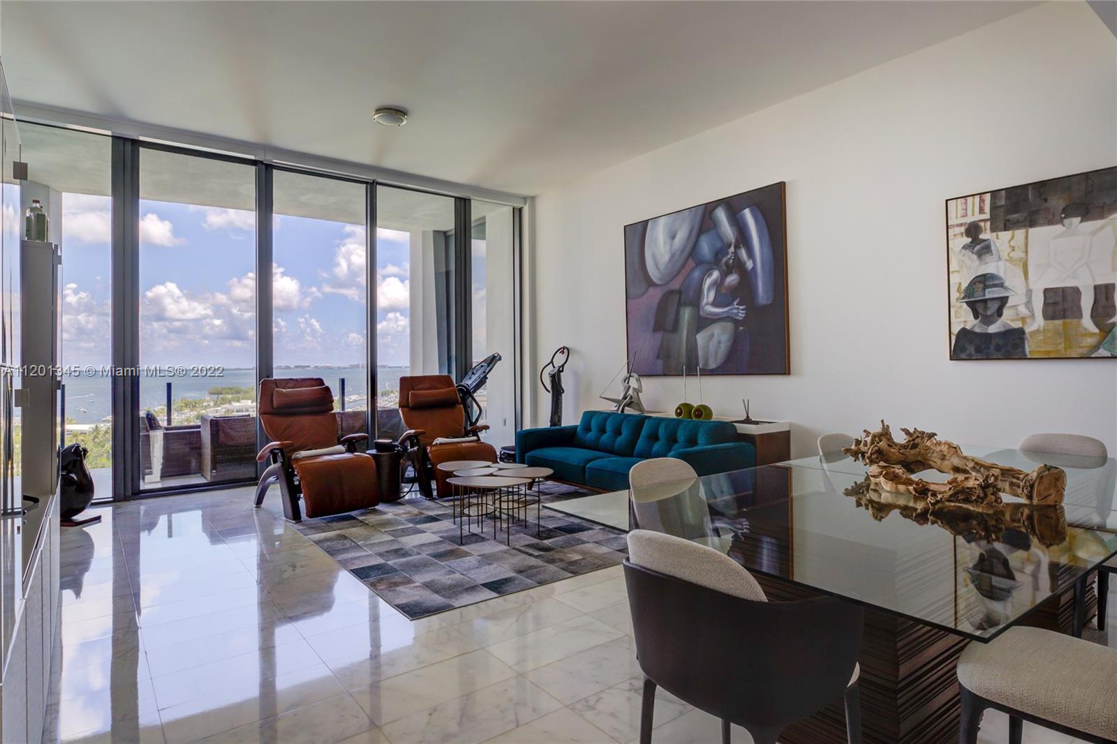 Breathtaking bay view from the 11th-floor. Luxury 2 bedroom + den converted into a 3
bedroom. A luxurious lifestyle awaits at the prestigious Two Park Grove Condo. The newest
development in Coconut Grove. Floor to ceiling glass walls and 12-foot ceilings. Marble
flooring throughout. 50,000 square feet of unparalleled amenities, and 4 acres of lush
gardens designed by Swiss landscape architect Enzo Enea. Business center with private
dining rooms. State-of-the-art fitness center including a private training room, spa, and
sauna for each residential tower. Library/lounge area, private elevator, wine cellar,
wine lockers, and much more.