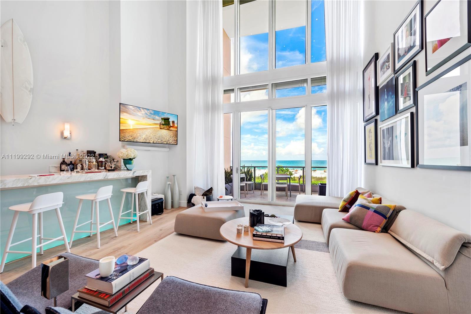 Unique loft-style beachfront residence in the world renowned Il Villaggio of Miami Beach. This fully-reconstructed 2-story townhouse features a contemporary and stylish design throughout complemented by stunning oceanfront views which can be enjoyed from multiple vantage points including a private balcony - perfect for outdoor entertainment and enjoying the perfect South Florida weather. BH-03 is one of only six Beach Houses in Il Villaggio and has 3 private entrances for an extra feel of safety and exclusivity. Featuring a sophisticated blend of elegance and modern design, BH-03 boasts 22-ft ceilings, luxurious finishes, and an expansive open floorplan. World-class amenities include private beach service, pool, grill, gym, concierge, security, and valet parking.