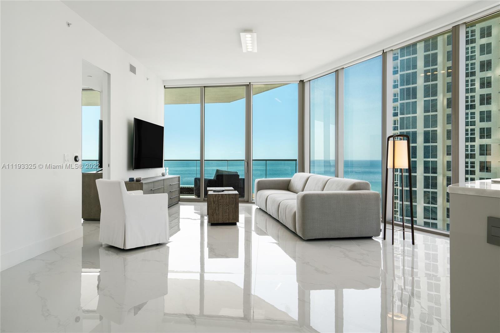 Stunning 2 bedrooms & 2.5 bathrooms residence with breathtaking views of the ocean and city skyline. Newly built, Armani Casa Residences is the most elegant address in Sunny Isles. 11th floor, 10" ft ceilings, surrounded with floor to ceiling windows. Corner unit with deep terraces and outdoor summer kitchen. Chefs kitchen by Armani Dada and state of the art appliances. Resort like amenities with beach & pool service, spa, oceanfront restaurant, movie theatre, fitness center, game room, yoga room, prive lounge and much more.