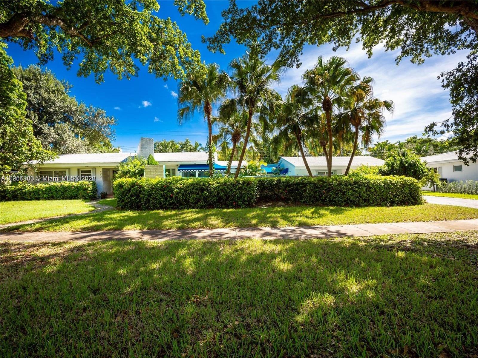 Beautiful oversized lot sitting in Coral Gables. Property consists of a main home with 3 beds/3 baths with a large great room & living room with vaulted ceilings, fireplace, dining area & an enclosed patio facing the pool area. The property also features a guest house that has its own room, living room and private bathroom.