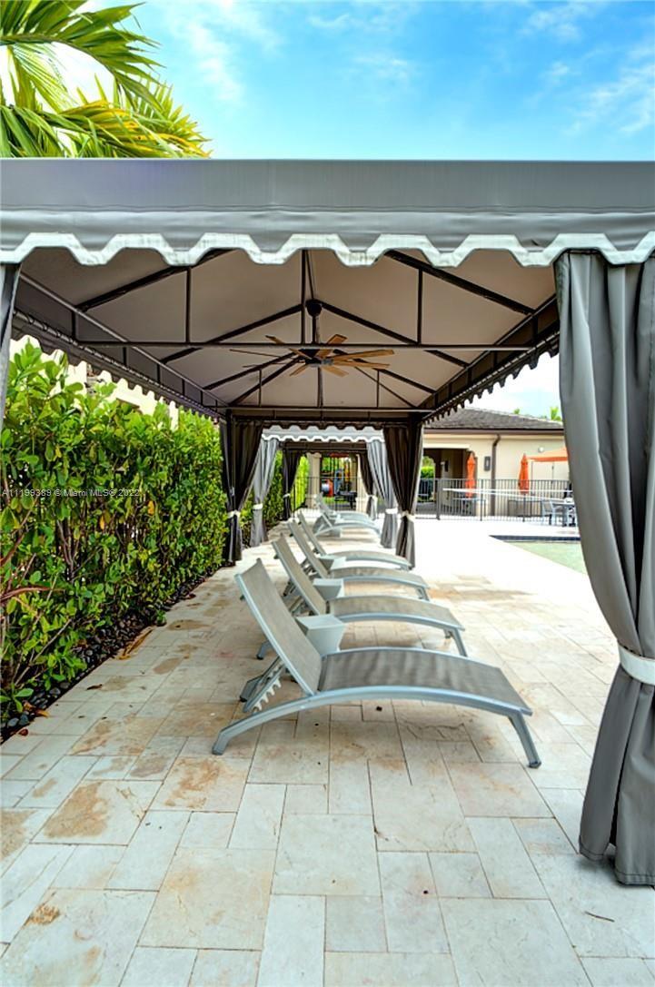 Pool deck, covered lounge area