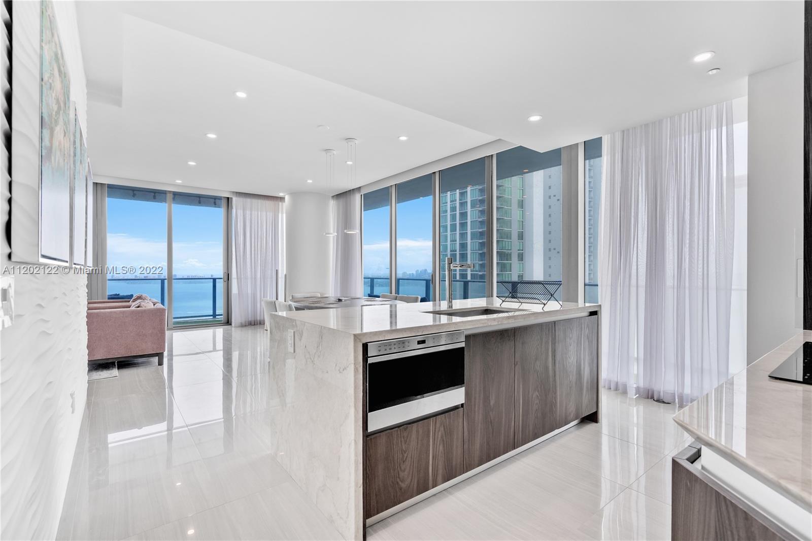 Beautiful 3 Bedroom 3.5 Bath SE Corner Residence. Enjoy the unobstructed water views and amazing downtown city views on the 180 degree wraparound balcony. This unit includes 1 parking spot, along with a wine locker and cigar locker.