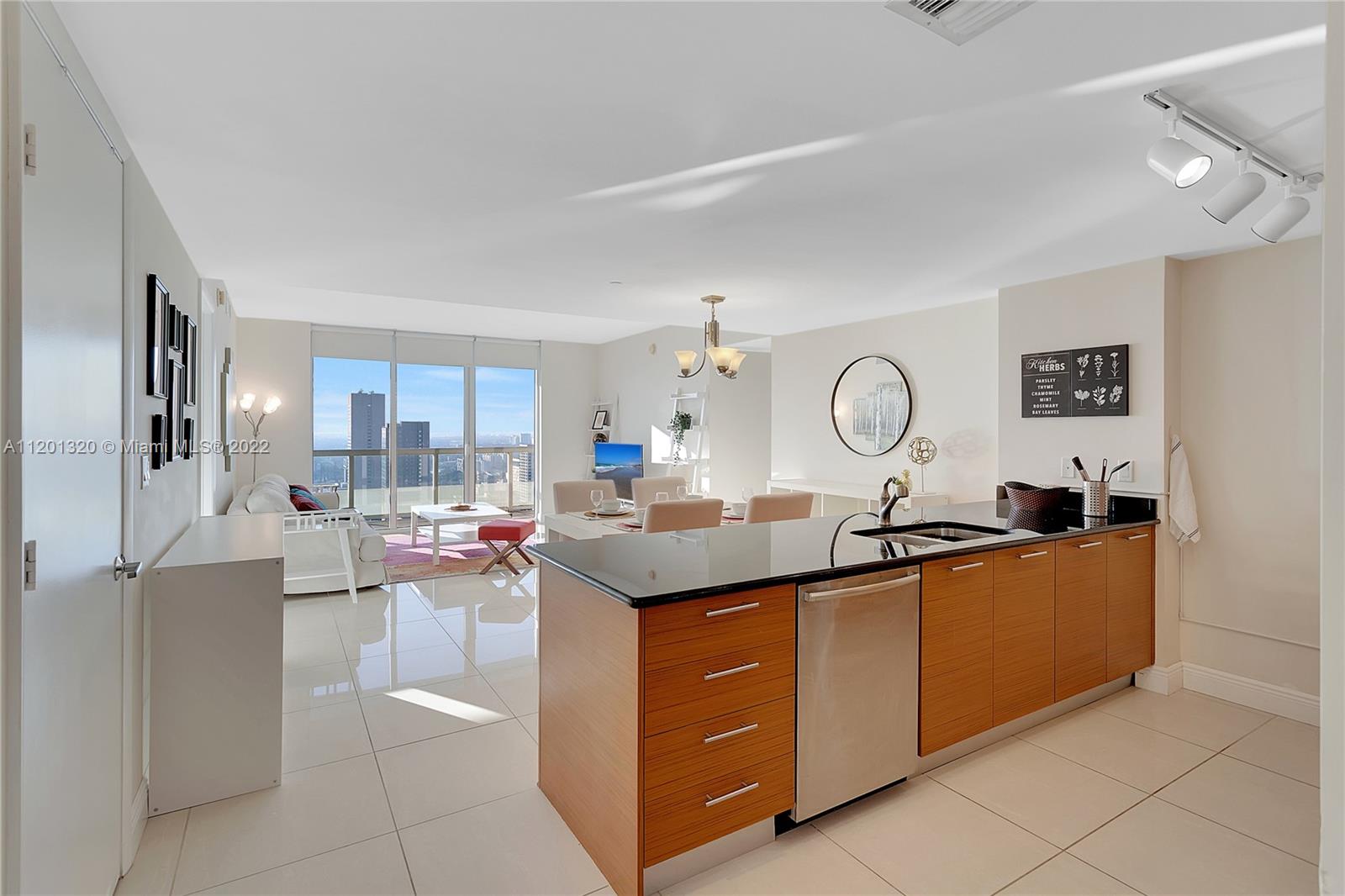 Gorgeous furnished 2 bedroom, 2 bath condo at 50 Biscayne Blvd.  The property boasts an extensive wrap around balcony with sweeping views of the city and Biscayne Bay. This open floor layout offers a spacious design and comes equipped with granite countertops, stainless steel appliances, porcelain floor & window treatments. Property is available fully furnished and is centrally located with walking distance to many places of interest including Whole Foods, Silverspot Cinema, Brickell, Bayside Marketplace and FTX arena. Comes with one assigned parking space.
Property is available July 15th 2022