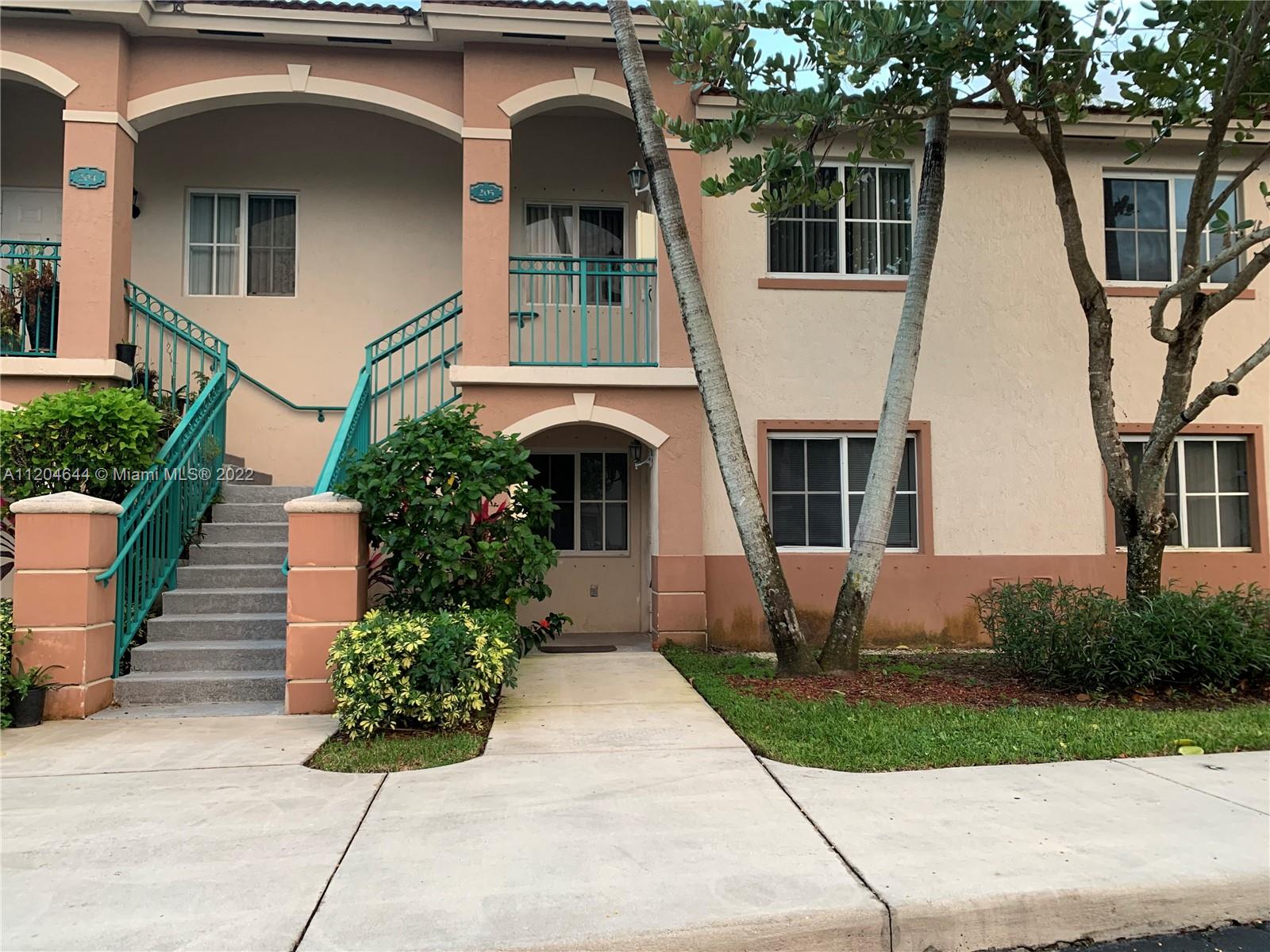 Lake view 2/2. Primary and secondary bedrooms have their own Walk-in closets. Good size storage closet outside. Gated community. Very well kept established neighborhood.