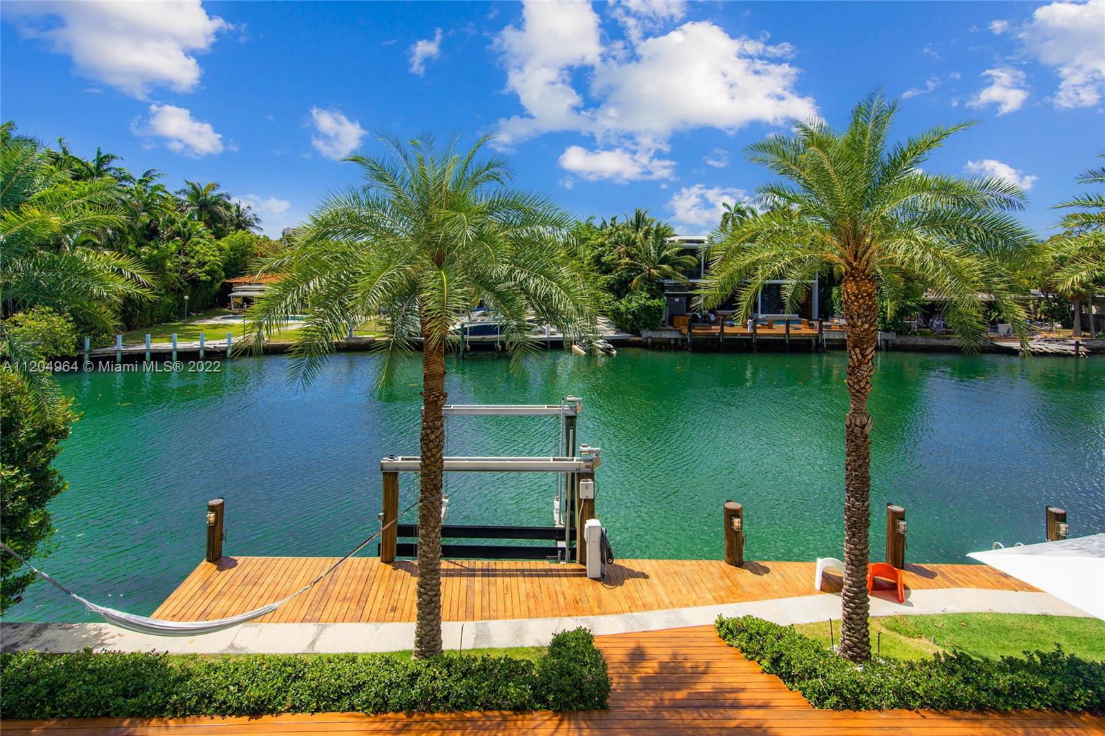 This stunning waterfront house is the perfect combination between luxury and modernity, Located on a quiet cul de sac Meridian ave. This two-story home was built in 2014, features 7 bedrooms & 7 bathrooms, with a large roof top. Entry foyer with an interior garden will lead you to a sleek chef’s kitchen w/top-of-the-line appliances, center island, custom cabinetry, wet bar and wine cellar. wide open living area tastefully decorated & family area with water views. A large 2nd floor principal suite with 2 private terraces & amazing principal bath w/custom walk-in closet. modern glass tiled pool looking out to the water, full private dock, large terrace, outdoor kitchen and BBQ area, perfect for entertaining.