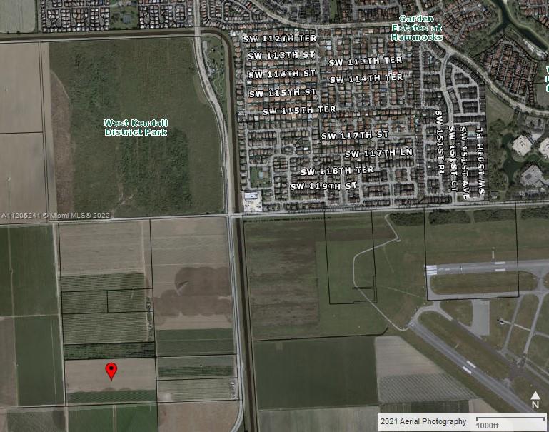 SW 162nd Ave & SW 128th St._medium view with airport  - Red dot on property