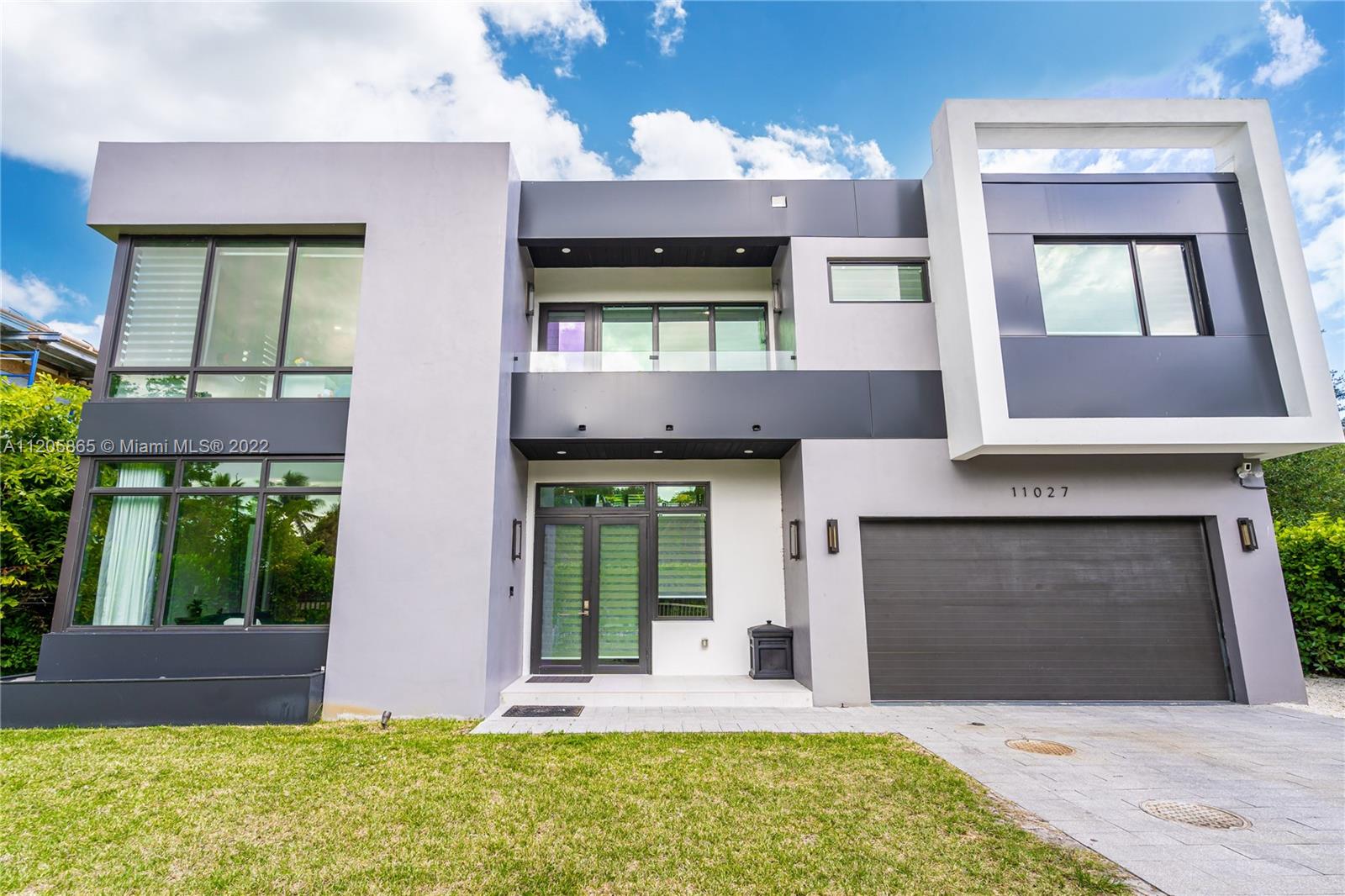 This beautiful, modern, and luxurious two-story home is located in Pinecrest and only two blocks away from US-1 and minutes away from the Palmetto and Dadeland mall. The downstairs area boasts an open floor plan that welcomes guest and family alike to the comforts of your home.  This 5-bedroom, 4.5-bathroom gated estate has 1 master, 2 suites and 2 bedrooms that share a Jack & Jill bathroom.  The house was built following modern designs and includes wooden accents that cozy up the home.  It also includes, a laundry room, 3 open terraces, an outdoor kitchen, a concrete flat roof, a gated rectangular pool, and turf play area.
Cash offers need to include proof of funds and all others offers need to be accompanied by a pre-approval letter.