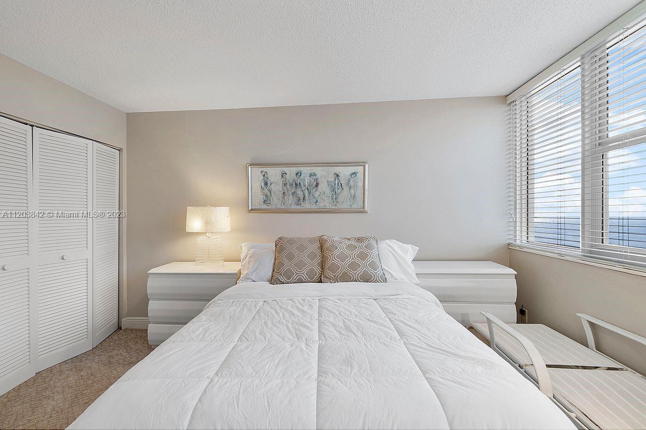 MAIN MASTER BEDROOM WITH PRIVATE SOUTH EAST OCEAN VIEWS