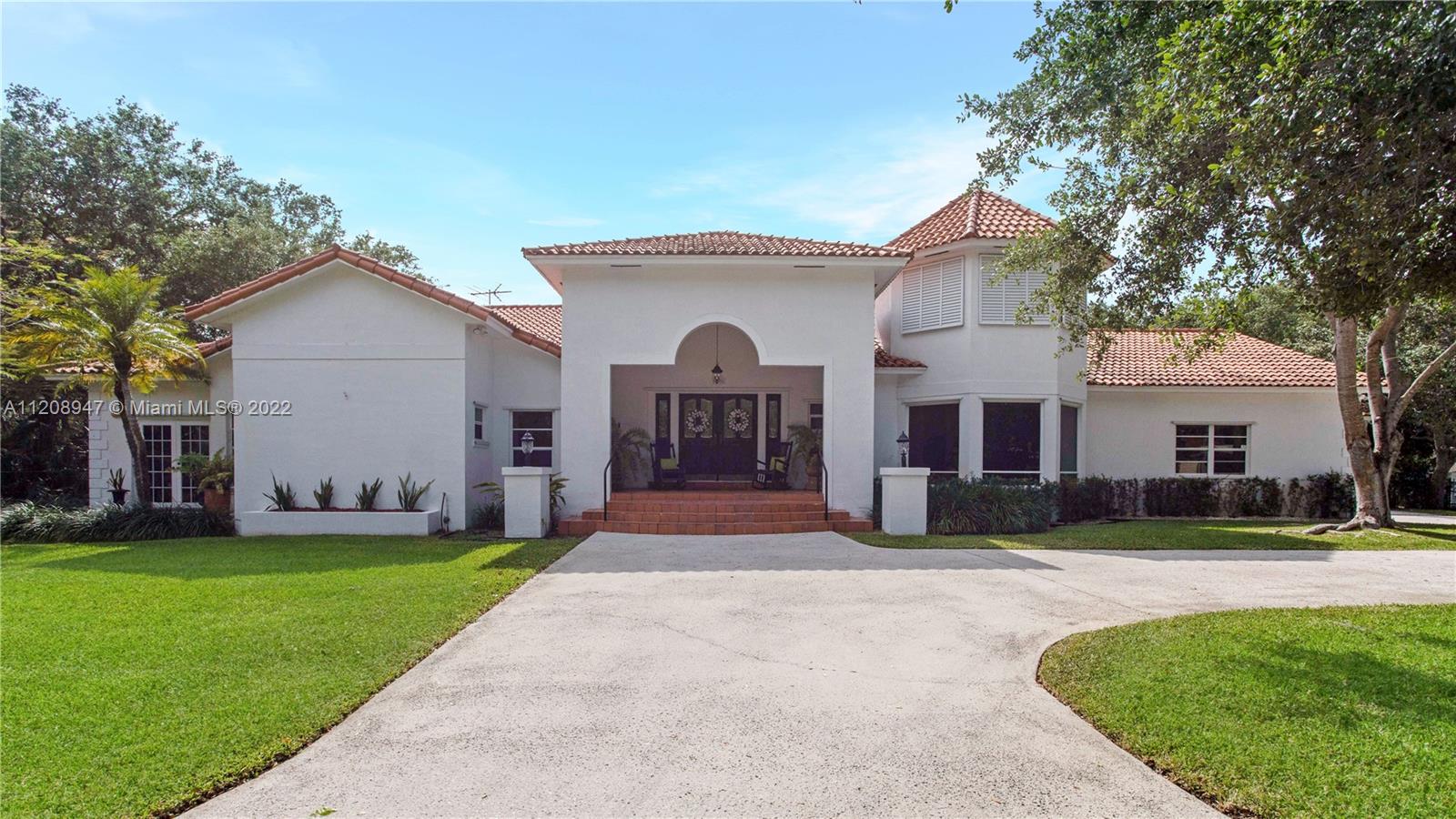 Beautiful 5br/4full & 2 half bh home on private secluded builder's ac. 4454 adj sq.ft. Two double car garages (one accommodates boat).Close to prestigious private schools(Palmer Trinity, Westminster, Montessori, top rated public school Palmetto High).Lots of natural light, french doors, large windows,high volume ceilings throughout home.Fenced & walled yard with numerous large established trees: oak pines palms palmettos mango avocado lychee starfruit & an undisturbed natural florida hammock. 1.5 miles to bay for kayaking, canoeing & windsurfing,4.5 mi. to Black Point Marina.Walk to neighborhood park on waterway. Large family rm with French drs to covered screened patio & to pool area.Laundry room, wifi antennas throughout house, tile flooring (wood floors in 4 bedrooms). Fabulous home!