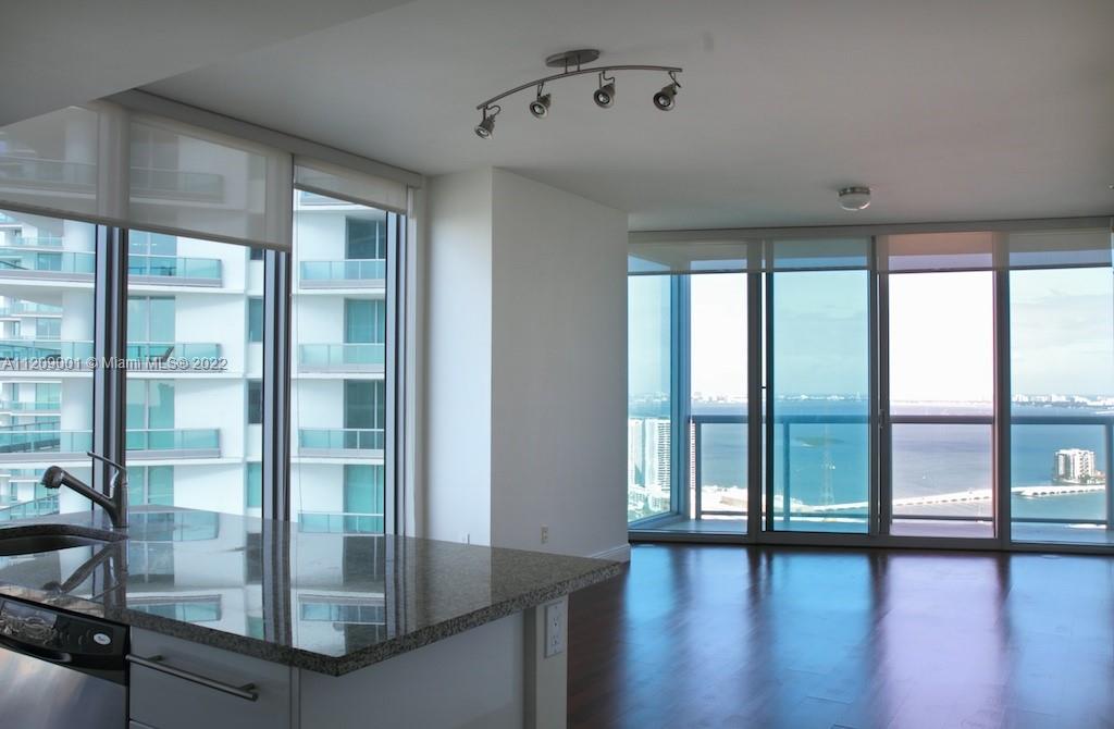 stunning view of the bay with great lay out , separate bedrooms and baths, featuring stainless steel appliances, marble countertop. Floor has been damaged and removed, seller can deliver the unit as is or with renovated floors. 2 tandem parking spaces, pool, spa, 24 hrs front desk.