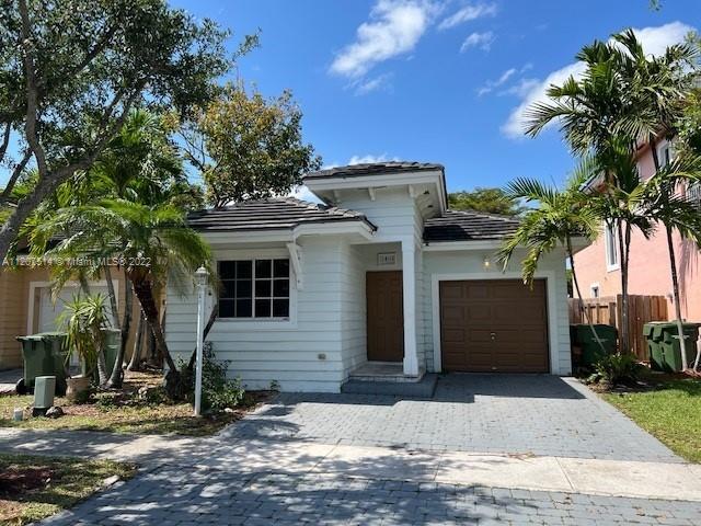 Cozy 3 bedroom /2 baths single family home in the Isles of Oasis. 2 Car garage, gated community.