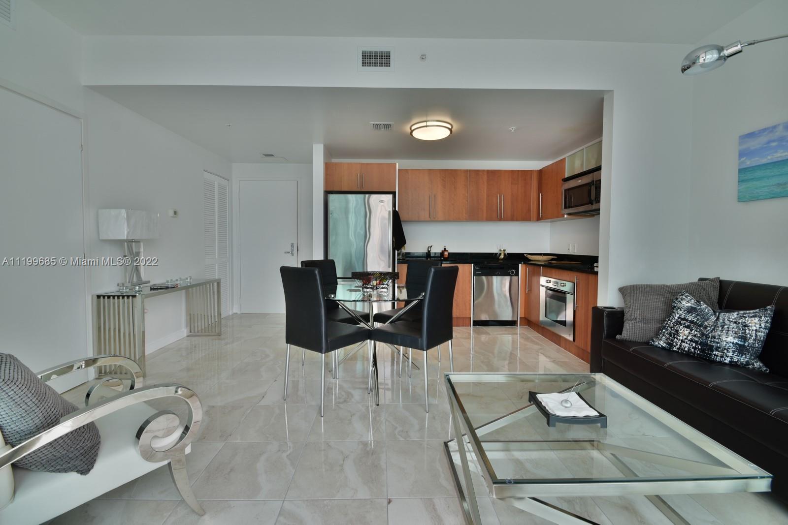 Beautiful condo with modern style furniture at The Met 1 building in Downtown Miami. This bright and clean
condo comes with ceramic floors, SS appliances & granite counter tops. Met 1 is located within walking distance from Brickell, Bayside & Arts District, Miami arena, Wholefoods, Restaurants, Downtown Shopping, etc. Public
transportation also makes it easy to move around. Building comes with two lobbies, business center, gym, pool,
social room w/pool table, library, 24h doorman & 24h valet service. Responsible European landlords.