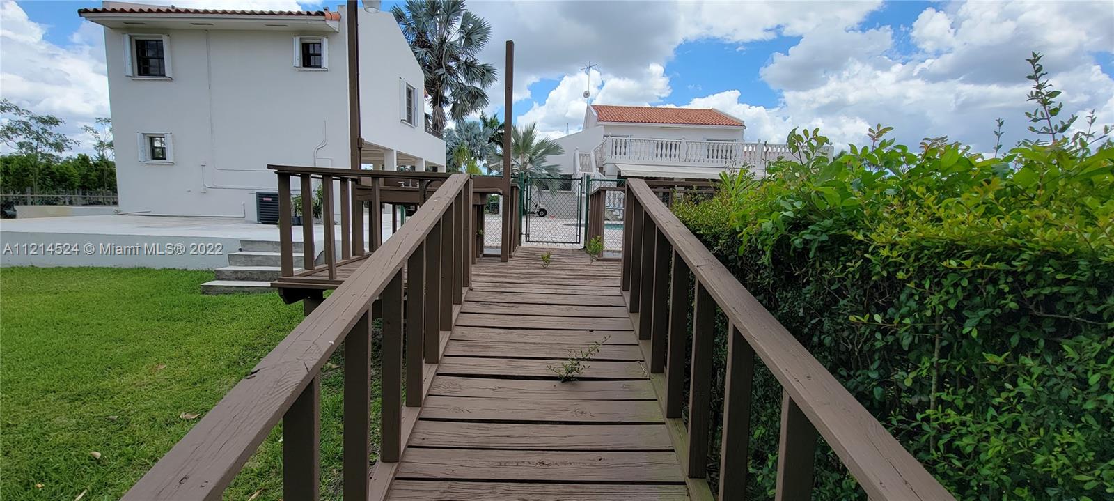 Rear view Guest house / residence, wooden walkway