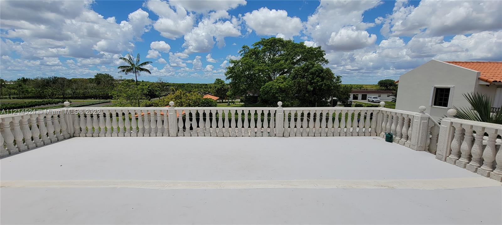 2nd floor balcony patio overlooking acreage to west