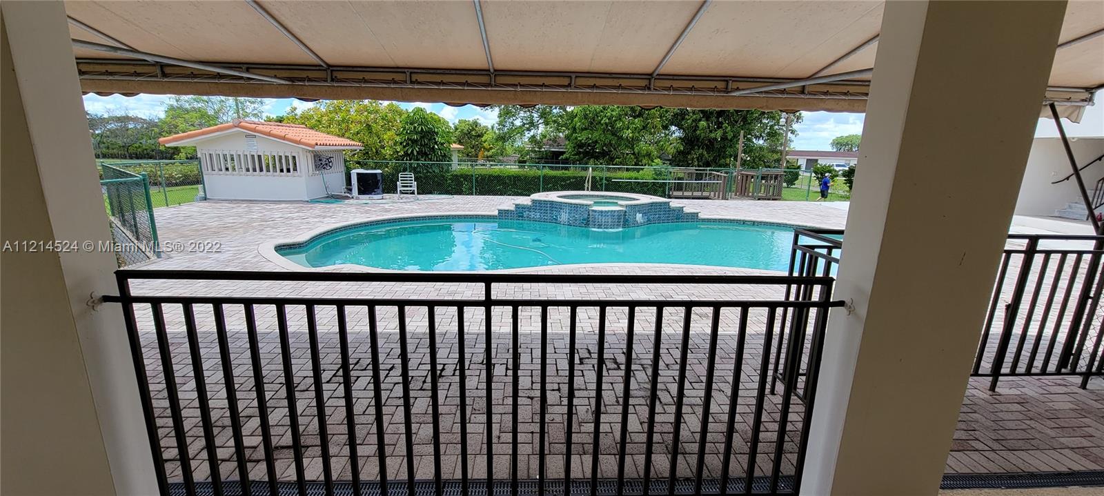 Covered patio overlooking pool/spa deck